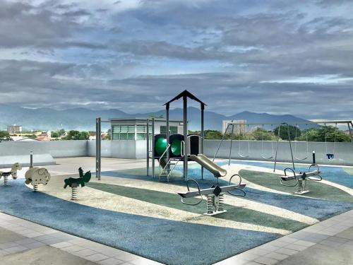 a rendering of a playground with a slide at Wabi-Sabi Guesthouse At Ipoh Town 侘寂风民宿 in Ipoh