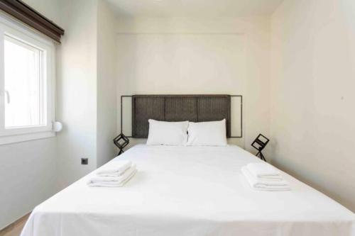 Ένα ή περισσότερα κρεβάτια σε δωμάτιο στο Tsimiski #apartment (one bedroom)