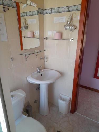 Koupelna v ubytování Yria Residencial