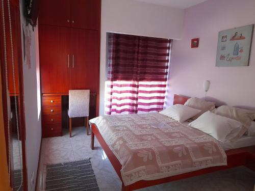 Katil atau katil-katil dalam bilik di Yria Residencial