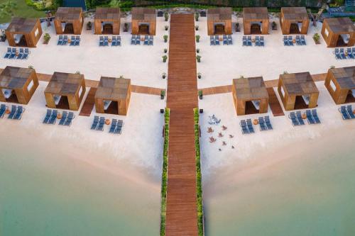 an aerial view of a resort on the beach at Vogue Hotel Supreme Bodrum in Torba