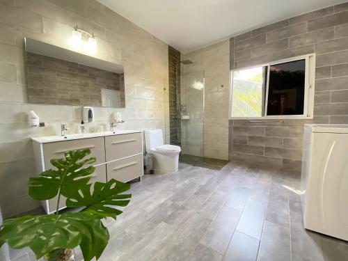 a bathroom with a sink and a toilet at Apartamento Carey in Cabrera