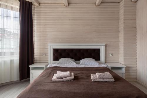 Ένα ή περισσότερα κρεβάτια σε δωμάτιο στο Villa Morishka & SPA