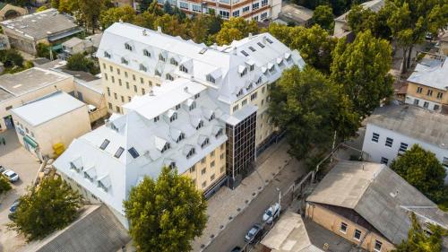 an overhead view of a white building in a city at APARTMENT IN BALTI LIB HOUSE in Bălţi