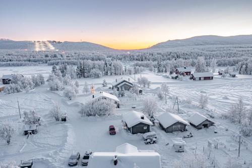 an aerial view of a village covered in snow at Levi Nietos in Kittilä