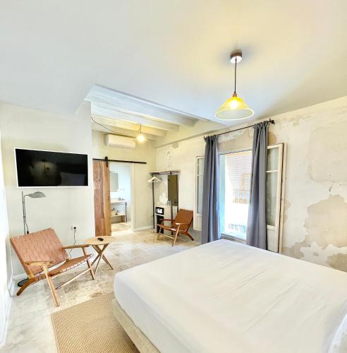 Ένα ή περισσότερα κρεβάτια σε δωμάτιο στο Blue Sardine Hostal Boutique Altea