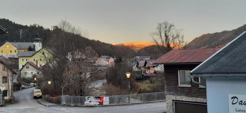 a small town with a mountain in the background at Tina a Petr , Lunz am See in Lunz am See