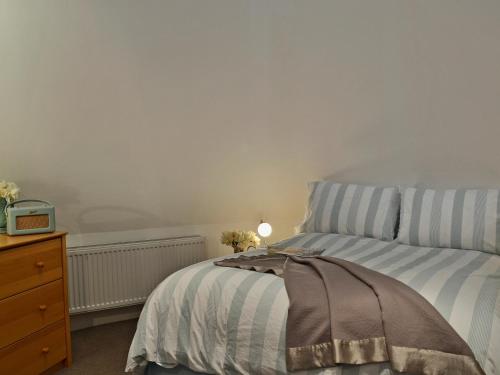 Ένα ή περισσότερα κρεβάτια σε δωμάτιο στο Cowford Oast