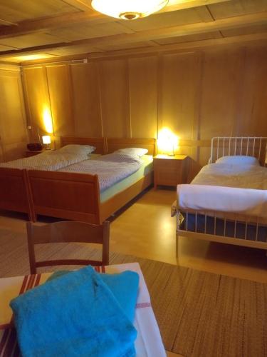 מיטה או מיטות בחדר ב-Friedlis Buurehof