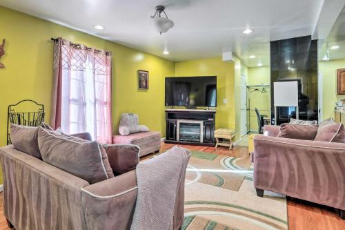 a living room with two couches and a tv at 5 Mi to National Mall Home in Washington DC in Washington, D.C.