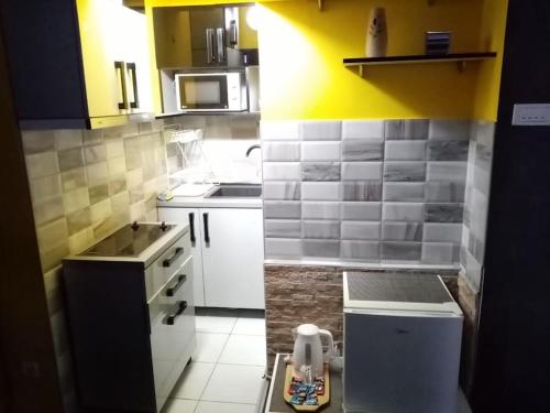 A cozinha ou cozinha compacta de Spa Apartment