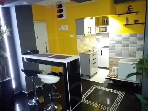 Spa Apartment tesisinde mutfak veya mini mutfak