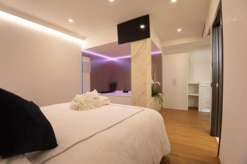 POPULA - The Lifestyle Hotelにあるベッド