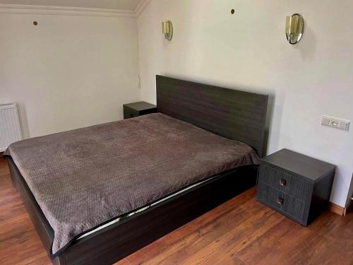 Кровать или кровати в номере Villa Tskneti