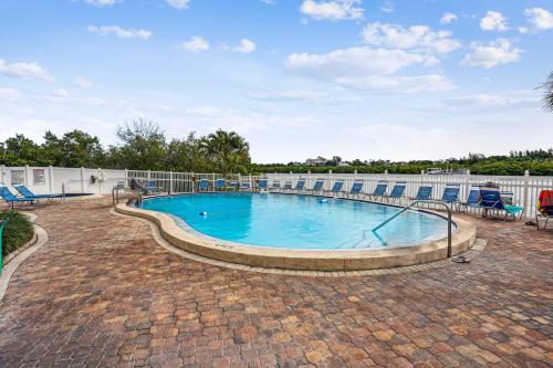 a large swimming pool on top of a building at Bayshore Yacht & Tennis 409 - Premier in Clearwater Beach