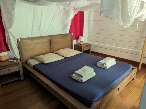 Posteľ alebo postele v izbe v ubytovaní Maisons Forban
