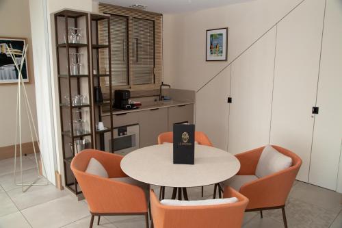 Kuchyň nebo kuchyňský kout v ubytování Splendid Hôtel & Spa