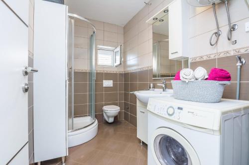 Kúpeľňa v ubytovaní APARTMAN SANDRA