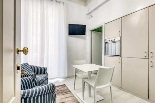 Kuchyň nebo kuchyňský kout v ubytování Asso Residence Stazione