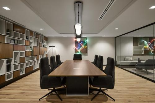 a conference room with a wooden table and chairs at Hyatt Place Montreal - Downtown in Montréal