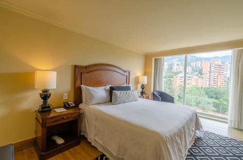 Ένα ή περισσότερα κρεβάτια σε δωμάτιο στο InterContinental Medellin - Movich by IHG