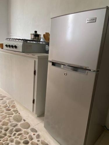 Una cocina o cocineta en Forever Beach Apartment