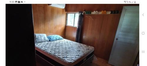 Postel nebo postele na pokoji v ubytování cabañas las garzas 1