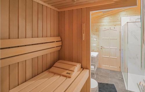 a small cabin with a toilet and a box in it at Beautiful Home In Merzalben With Kitchen in Merzalben