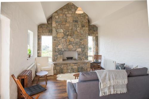 Posezení v ubytování Paddy Carrolls Cottage