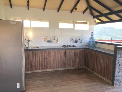 Kuchyň nebo kuchyňský kout v ubytování Asturias Finca Campestre Restrepo Valle