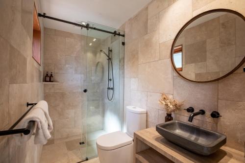 a bathroom with a sink and a shower at WATTLE TREE HILL in Gundagai