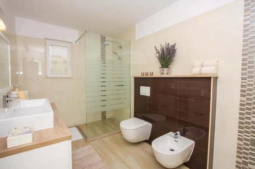 Apartments by the sea Trogir - 20307