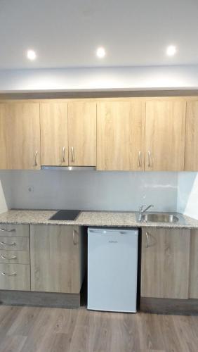 Kuchyň nebo kuchyňský kout v ubytování Apartamentos Turísticos Teruel