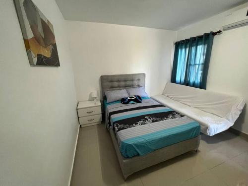 Postel nebo postele na pokoji v ubytování Peaceful getaway in Punta Cana w/ discounts