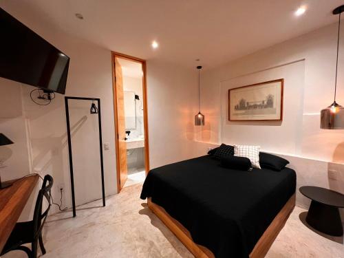 Postel nebo postele na pokoji v ubytování Hotel Atia