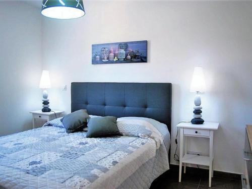 En eller flere senge i et værelse på Appartement Le Lavandou, 2 pièces, 4 personnes - FR-1-251-122