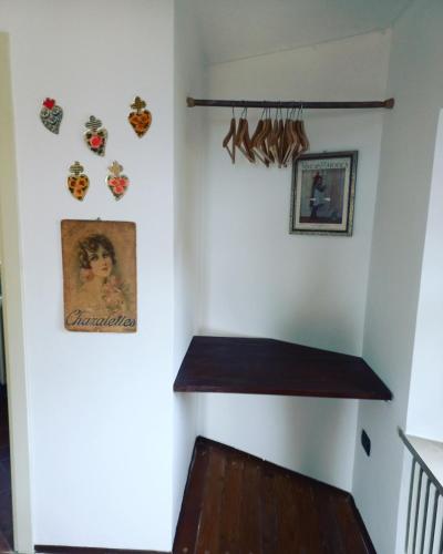 a stairwell in a house with a wooden floor at Il giardino di Olivia in Guarene