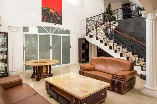 Posezení v ubytování Alameda Cariari Boutique Hotel
