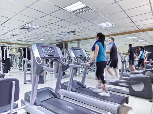 a group of people walking on tread machines in a gym at Vasia Sea Retreat in Sissi