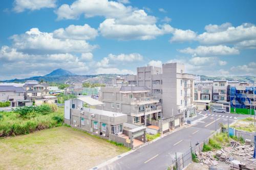 an aerial view of a city with buildings at Taitung Knock Knock Smart Stay in Taitung City
