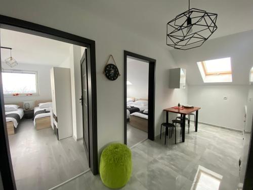 Katil atau katil-katil dalam bilik di Apartamenty Emerald Hills