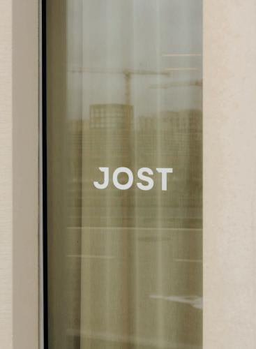 a glass window with the word lost written on it at JOST Hotel Montpellier Centre St Roch in Montpellier