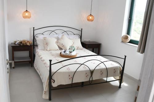 Ένα ή περισσότερα κρεβάτια σε δωμάτιο στο Karinta Bay Apartments