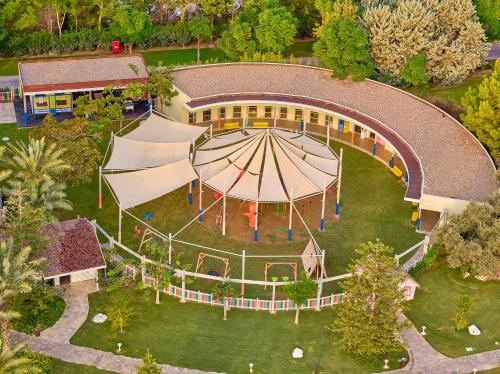 an overhead view of a building with a large tent at Lara Barut Collection-Ultra All Inclusive in Lara