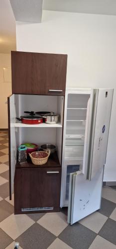 Kuchyň nebo kuchyňský kout v ubytování APARTMAN MURKO S-1