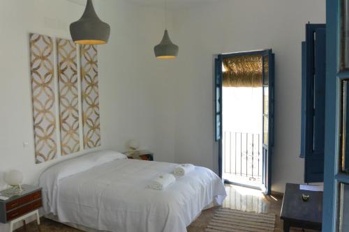 Postel nebo postele na pokoji v ubytování Corner Place 21 - Centro Histórico