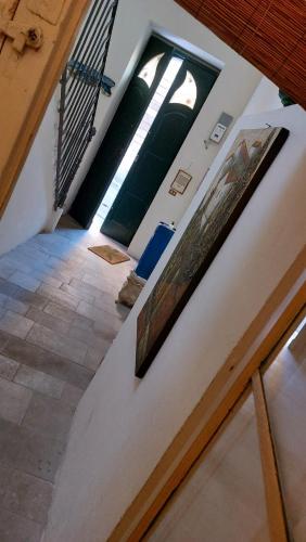 a view from the top of a room with a stairway at Antica Via delle Aie in Ruffano