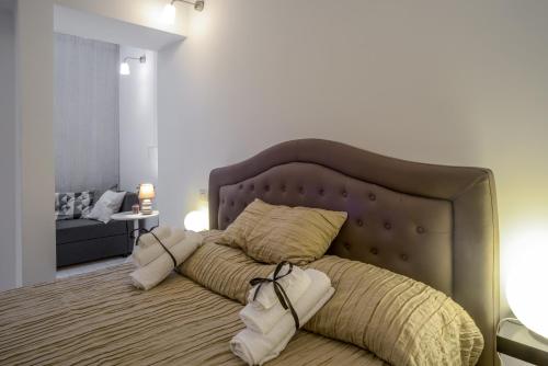 Postel nebo postele na pokoji v ubytování Intra' Residenza in Trastevere