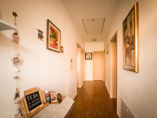 a room with a hallway with a chalkboard on the wall at Panorama Glamping Visole in Slovenska Bistrica