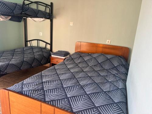 Ένα ή περισσότερα κρεβάτια σε δωμάτιο στο AETIA-TSIOURGIAKA